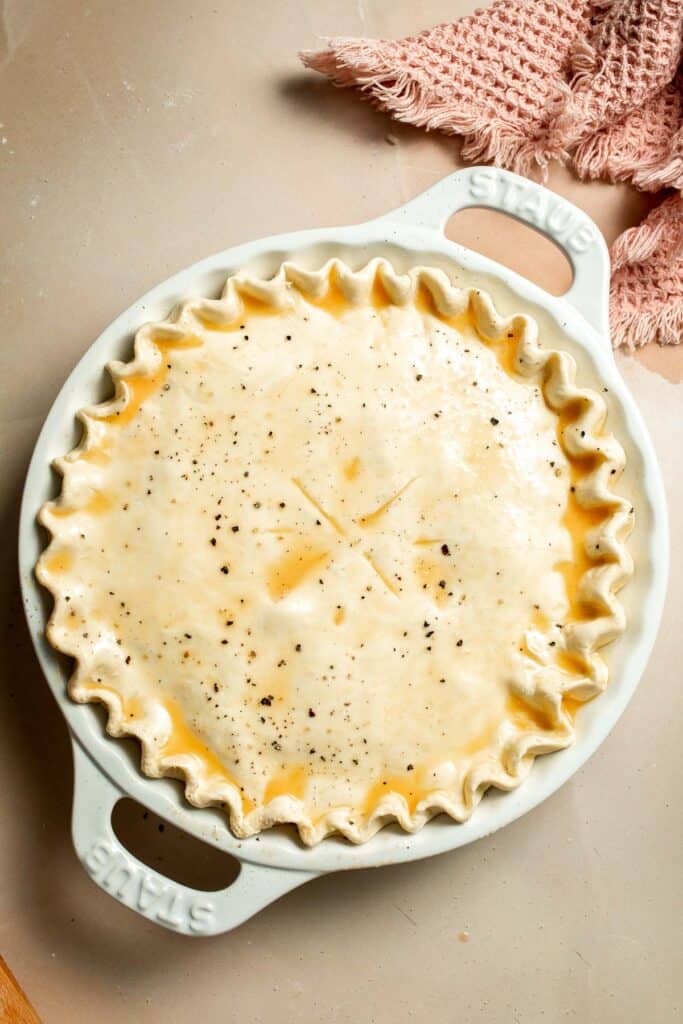 Vegetarian Pot Pie is truly the ultimate comfort food. The creamy filling is loaded with tender veggies, all wrapped in a buttery, flaky puff pastry crust. | aheadofthyme.com