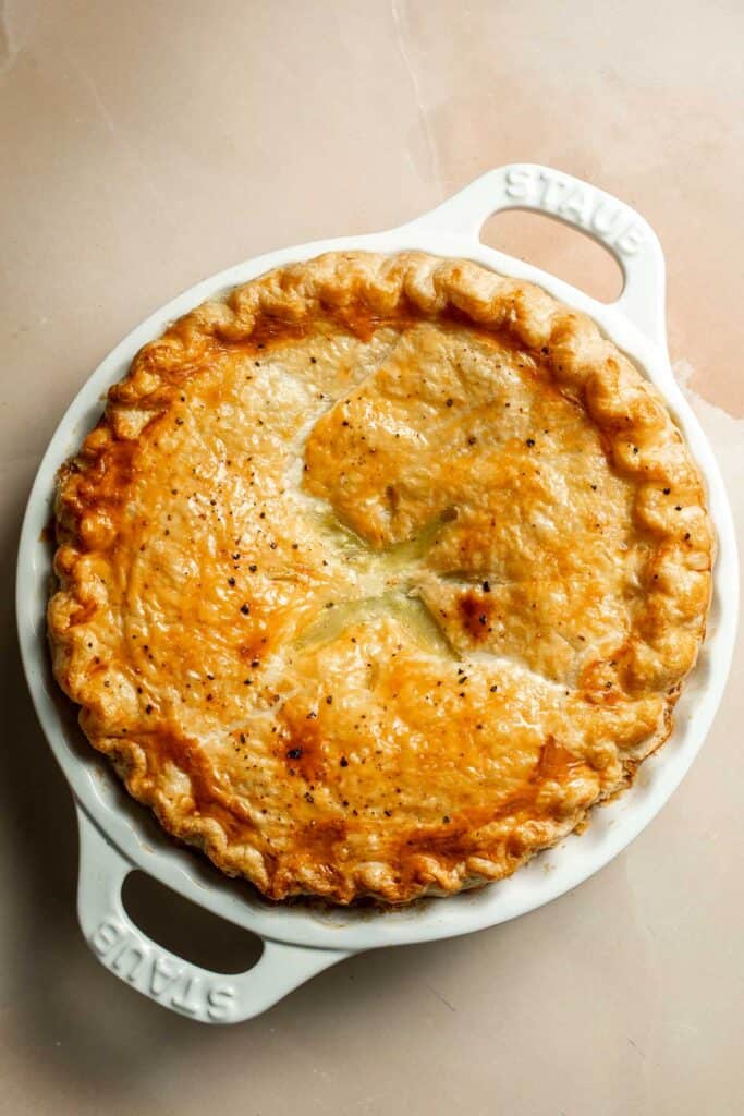 Vegetarian Pot Pie is truly the ultimate comfort food. The creamy filling is loaded with tender veggies, all wrapped in a buttery, flaky puff pastry crust. | aheadofthyme.com