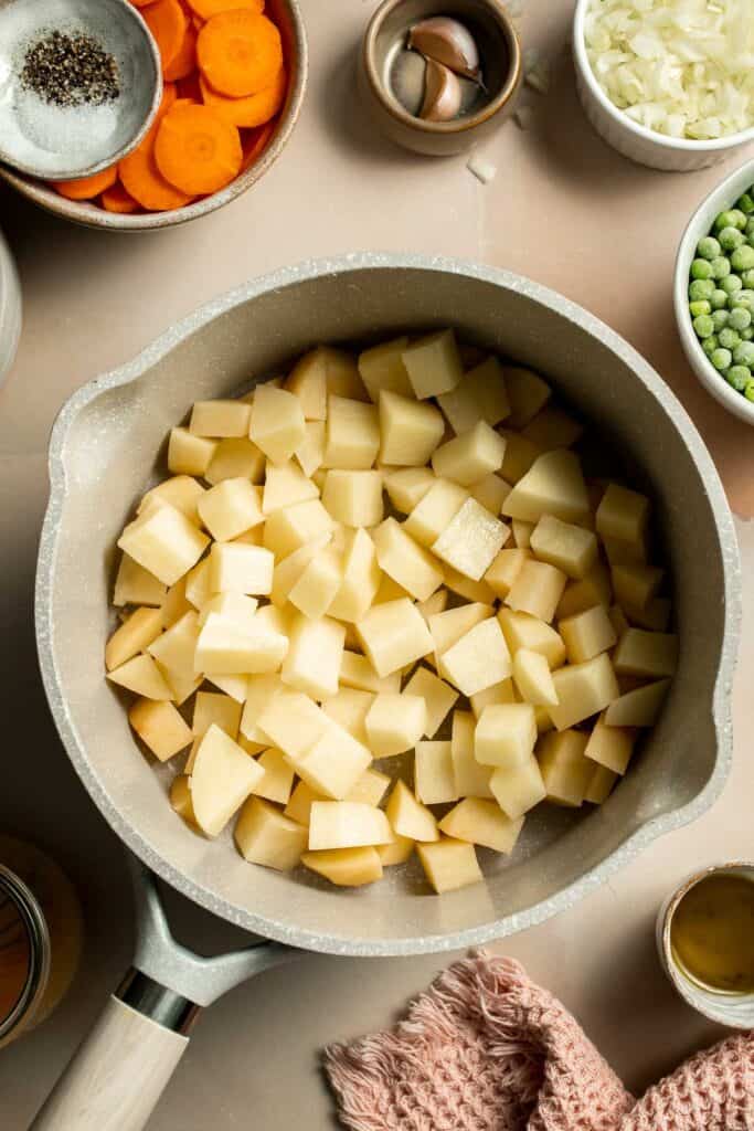 Vegetarian Pot Pie is truly the ultimate comfort food. The creamy filling is loaded with tender veggies, all wrapped in a buttery, flaky puff pastry crust. | aheadofthyme.com