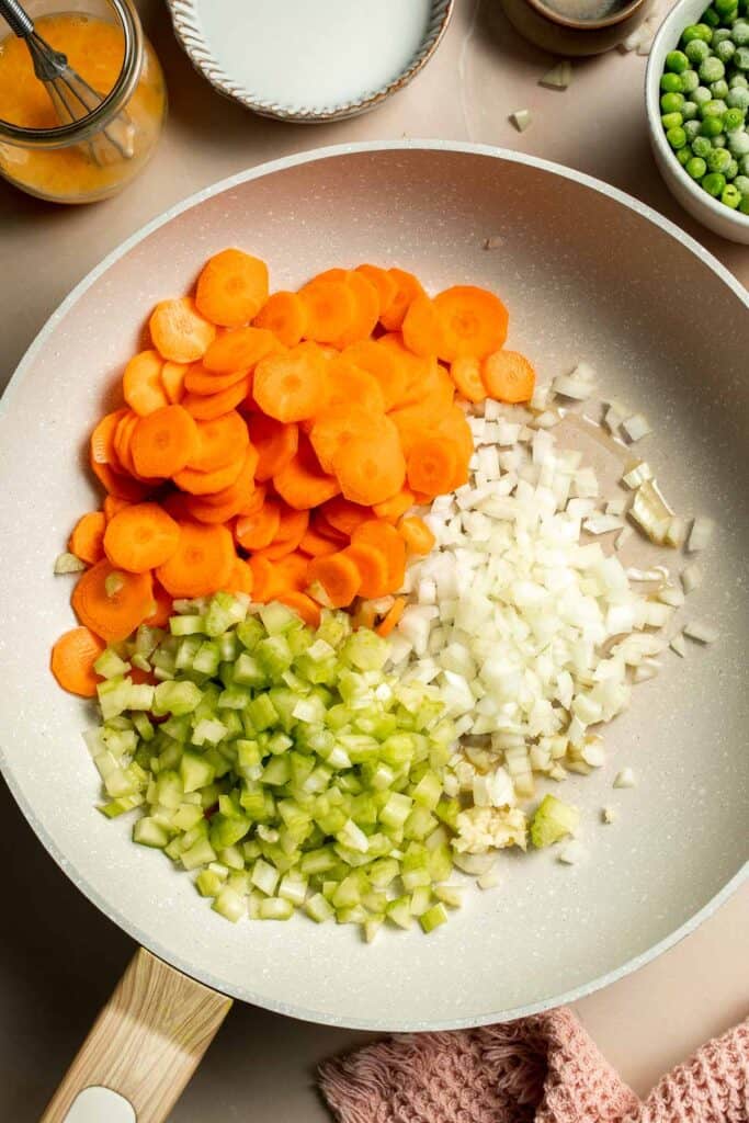 Vegetarian Pot Pie is truly the ultimate comfort food. The creamy filling is loaded with tender veggies, all wrapped in a buttery, flaky puff pastry crust. | aheadofthyme.com