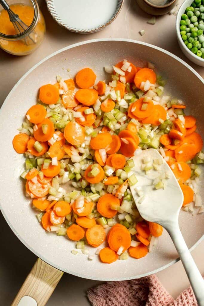 Vegetarian Pot Pie is truly the ultimate comfort food. The creamy filling is loaded with tender veggies, all wrapped in a buttery, flaky puff pastry crust. | aheadofthyme.com