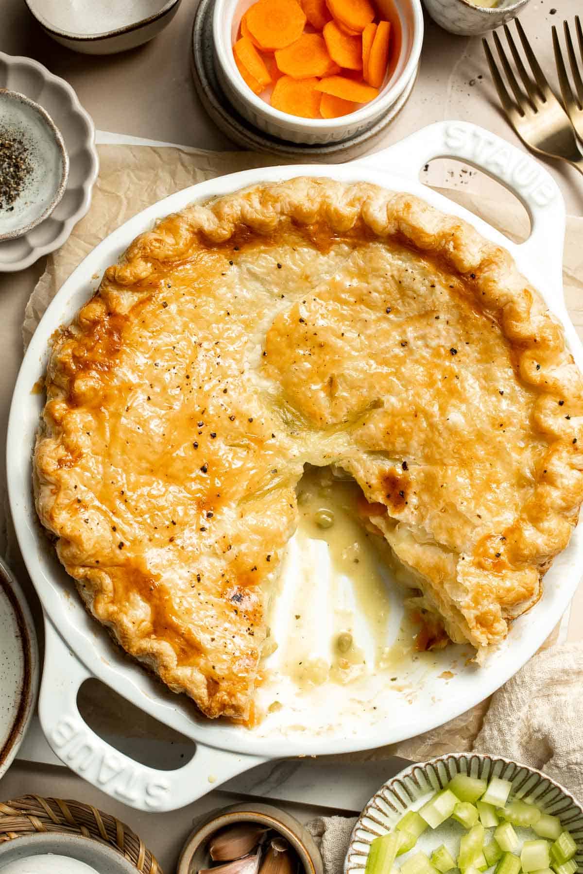 Vegetarian Pot Pie is truly the ultimate comfort food. The creamy filling is loaded with tender veggies, all wrapped in a buttery, flaky puff pastry crust. | aheadofthyme.com