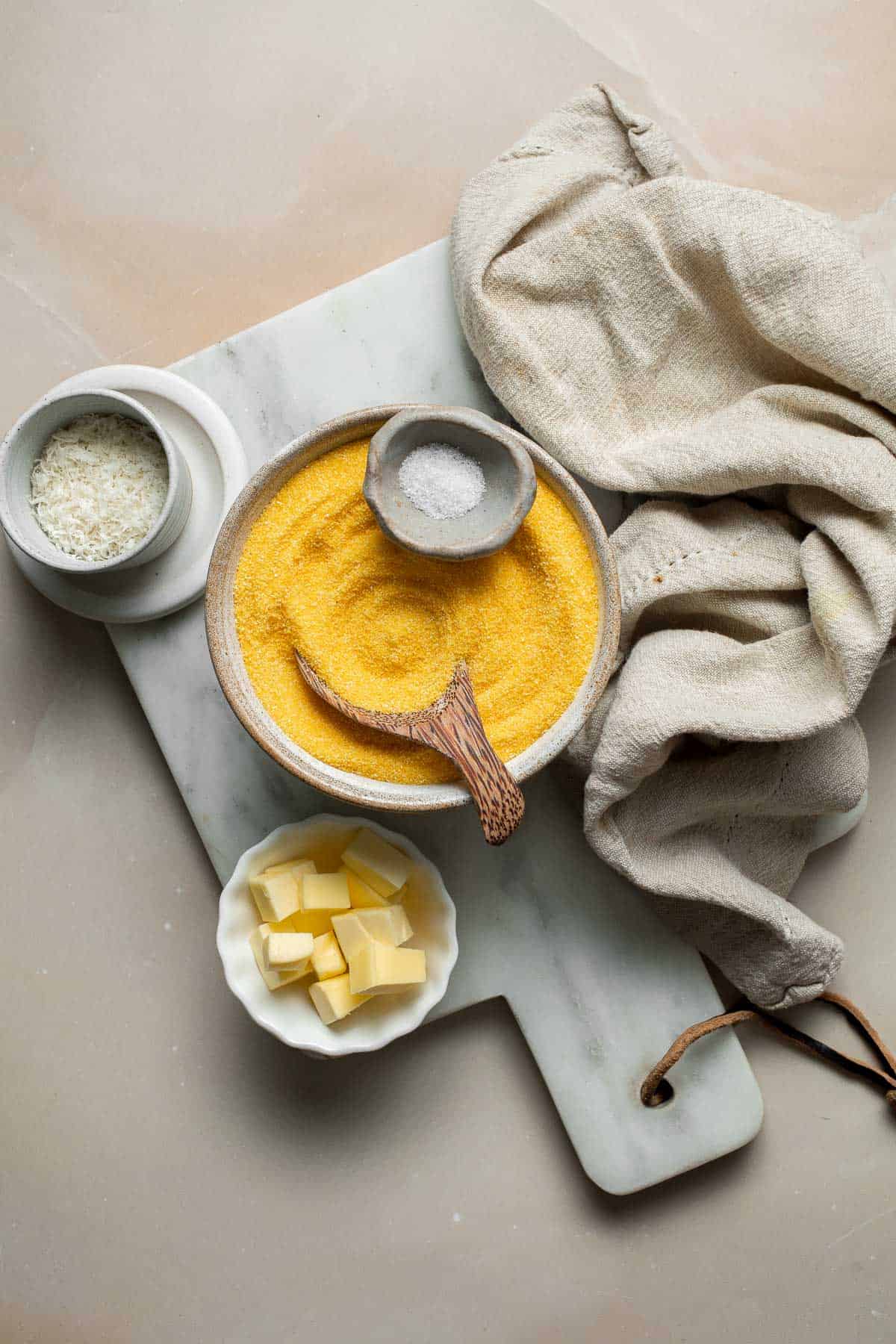 Creamy Polenta is simple, warm, and comforting side dish, made with a handful of simple ingredients and about 30 minutes of time. It's gluten-free too! | aheadofthyme.com