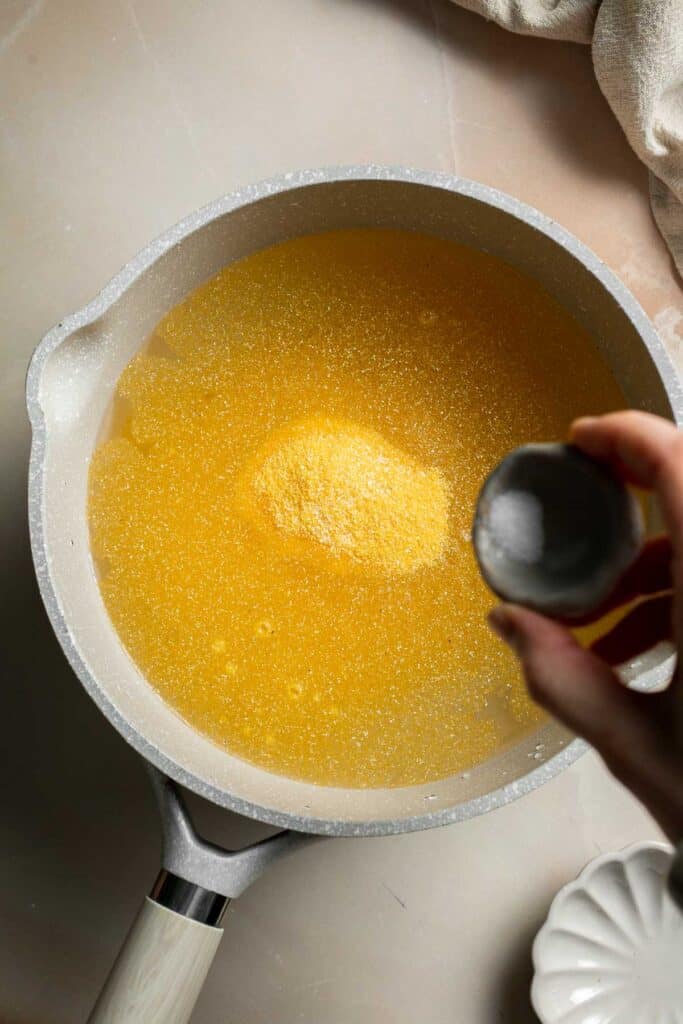 Creamy Polenta is simple, warm, and comforting side dish, made with a handful of simple ingredients and about 30 minutes of time. It's gluten-free too! | aheadofthyme.com
