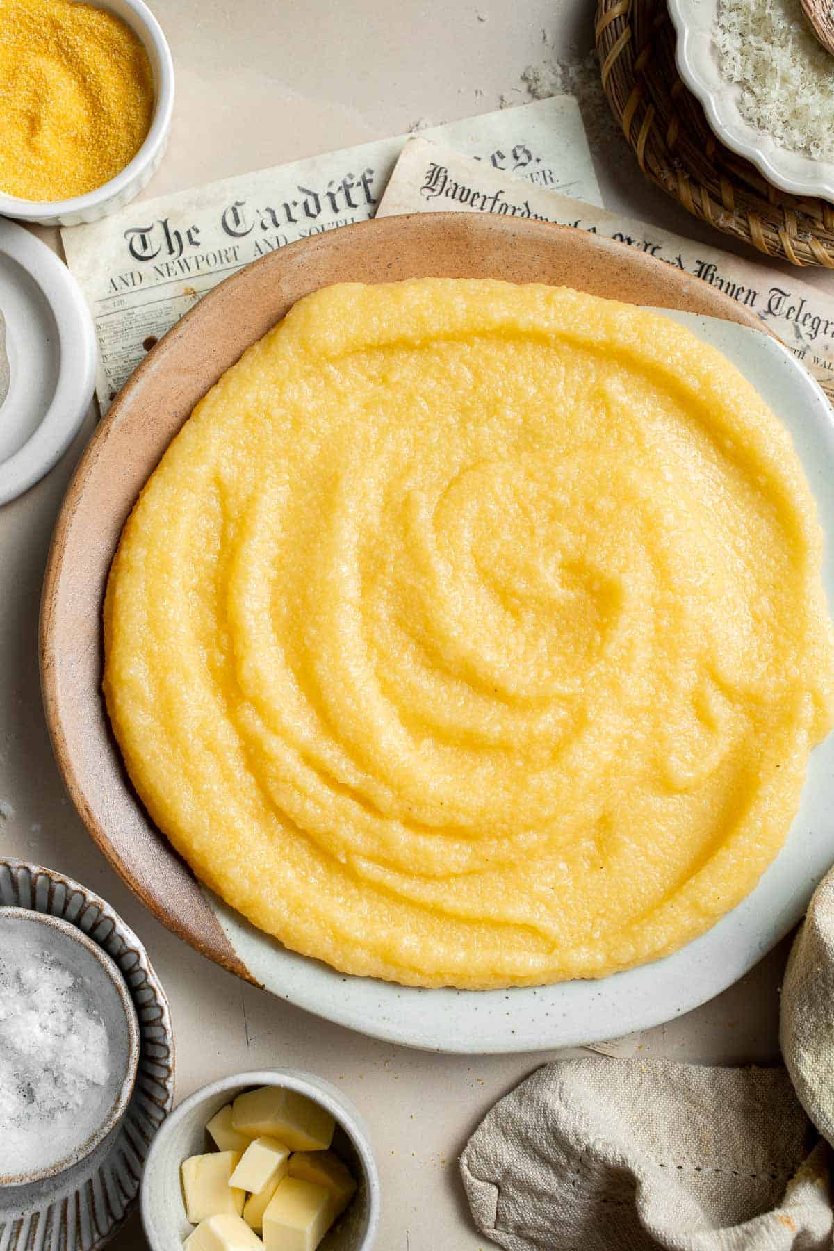 Creamy Polenta is simple, warm, and comforting side dish, made with a handful of simple ingredients and about 30 minutes of time. It's gluten-free too! | aheadofthyme.com