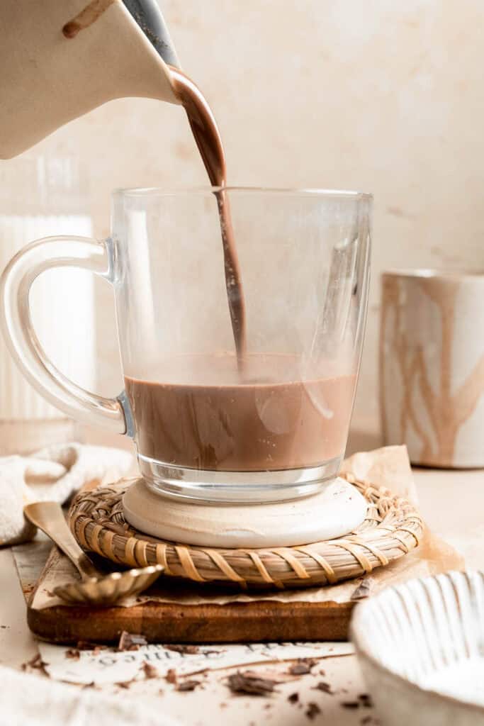 Homemade Hot Chocolate is made with actual chocolate, melted into milk, and whisked until smooth and creamy. No more prepackaged mixes! | aheadofthyme.com