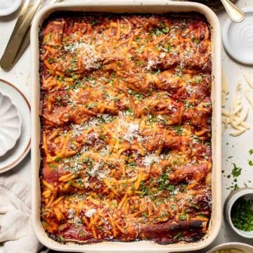 Classic Manicotti is everything you love about Italian comfort food — creamy ricotta, tender pasta, and a rich, savory marinara sauce baked until bubbly. | aheadofthyme.com