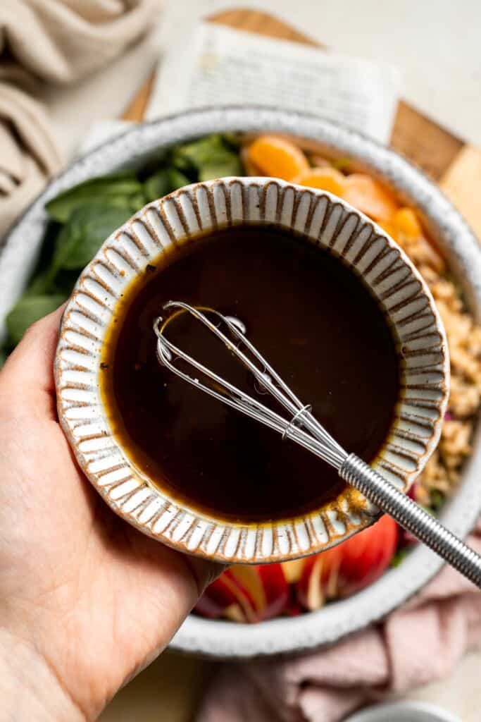 Festive Winter Pomegranate Salad is studded with sweet pomegranate seeds, apples, oranges, and feta, all tossed in a homemade balsamic vinaigrette. | aheadofthyme.com