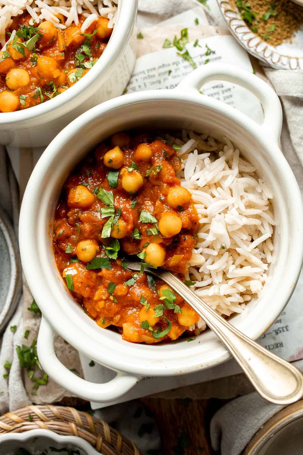 Moroccan Chickpea Stew made with tender chickpeas simmered in a fragrant, spiced tomato broth, is a simple, flavorful vegan meal that’s ready in 30 minutes! | aheadofthyme.com