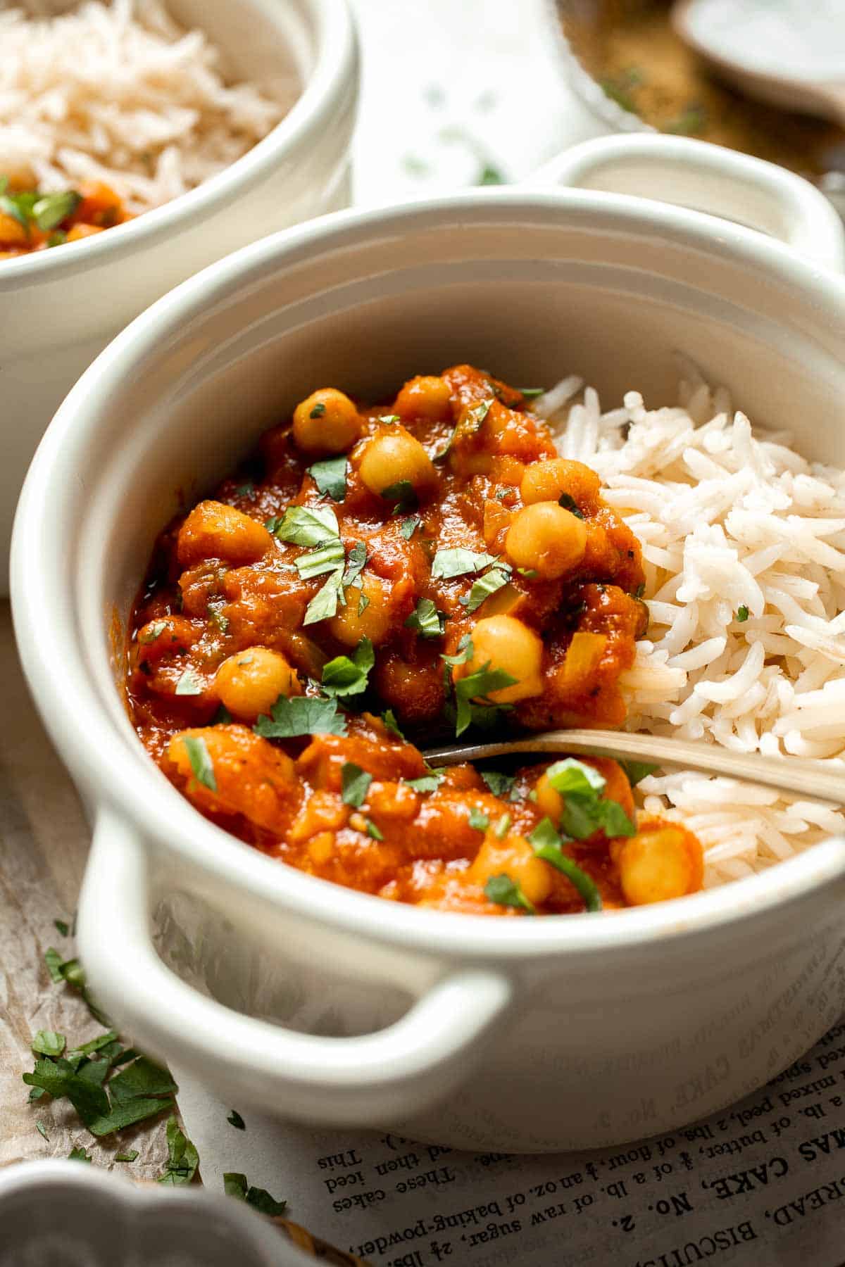Moroccan Chickpea Stew made with tender chickpeas simmered in a fragrant, spiced tomato broth, is a simple, flavorful vegan meal that’s ready in 30 minutes! | aheadofthyme.com