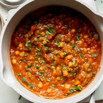 Moroccan Chickpea Stew made with tender chickpeas simmered in a fragrant, spiced tomato broth, is a simple, flavorful vegan meal that’s ready in 30 minutes! | aheadofthyme.com