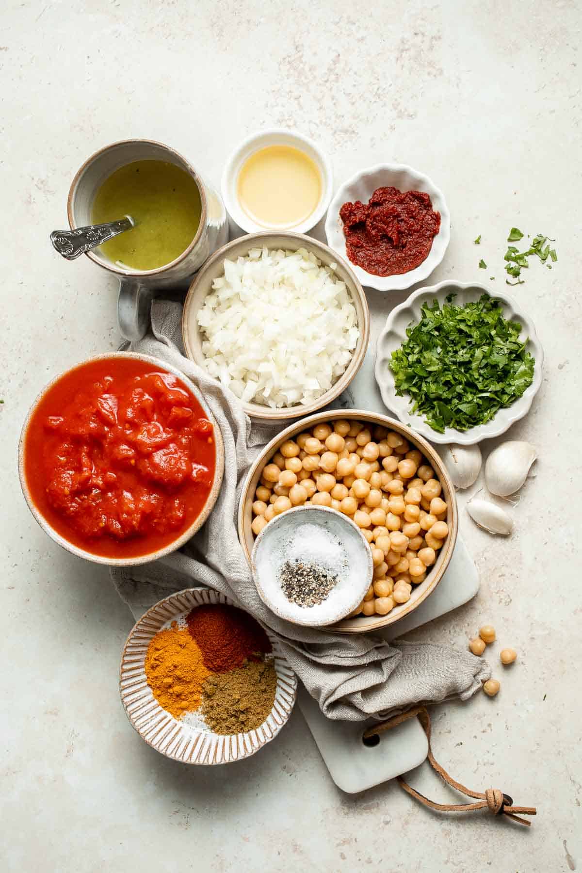 Moroccan Chickpea Stew made with tender chickpeas simmered in a fragrant, spiced tomato broth, is a simple, flavorful vegan meal that’s ready in 30 minutes! | aheadofthyme.com