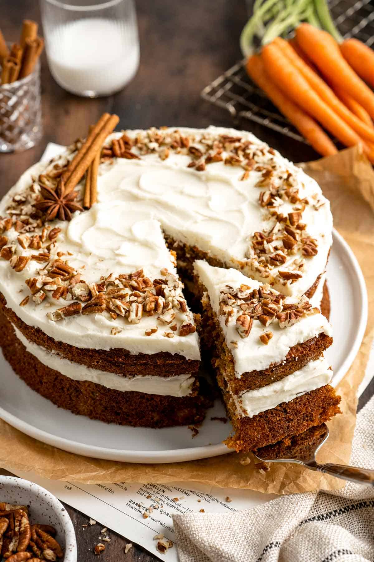 Made with fresh carrots, this classic Carrot Cake is soft, moist, warmly spiced, and topped with an ultra-creamy cream cheese frosting. | aheadofthyme.com