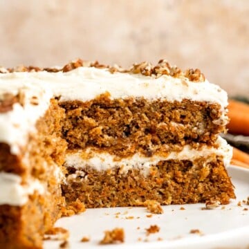 Made with fresh carrots, this classic Carrot Cake is soft, moist, warmly spiced, and topped with an ultra-creamy cream cheese frosting. | aheadofthyme.com