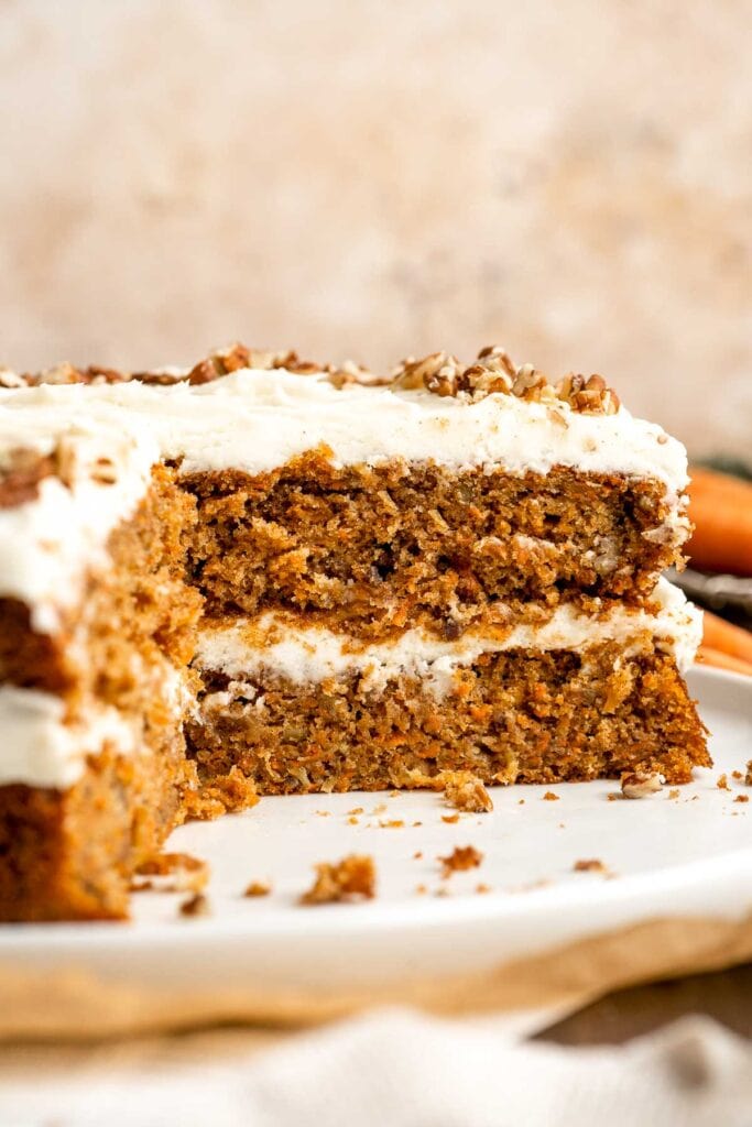 Made with fresh carrots, this classic Carrot Cake is soft, moist, warmly spiced, and topped with an ultra-creamy cream cheese frosting. | aheadofthyme.com