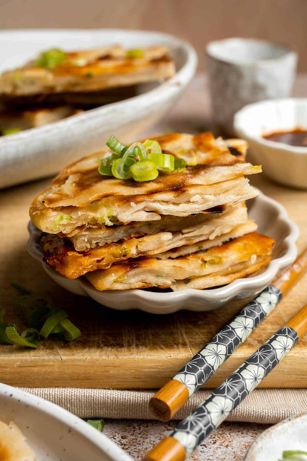 Chinese Scallion Pancakes are crispy, flaky, and packed with savory flavor in every bite. Better than takeout and surprisingly easy to make at home! | aheadofthyme.com