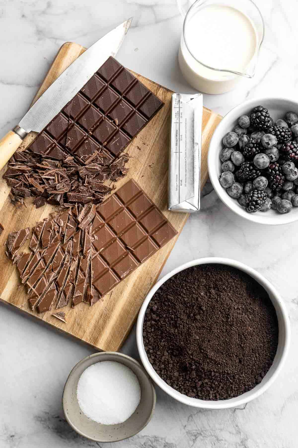 This Chocolate Tart is rich, decadent, and layered with the perfect balance of chocolate ganache and Oreo cookie crust. Way easier to make than you think! | aheadofthyme.com