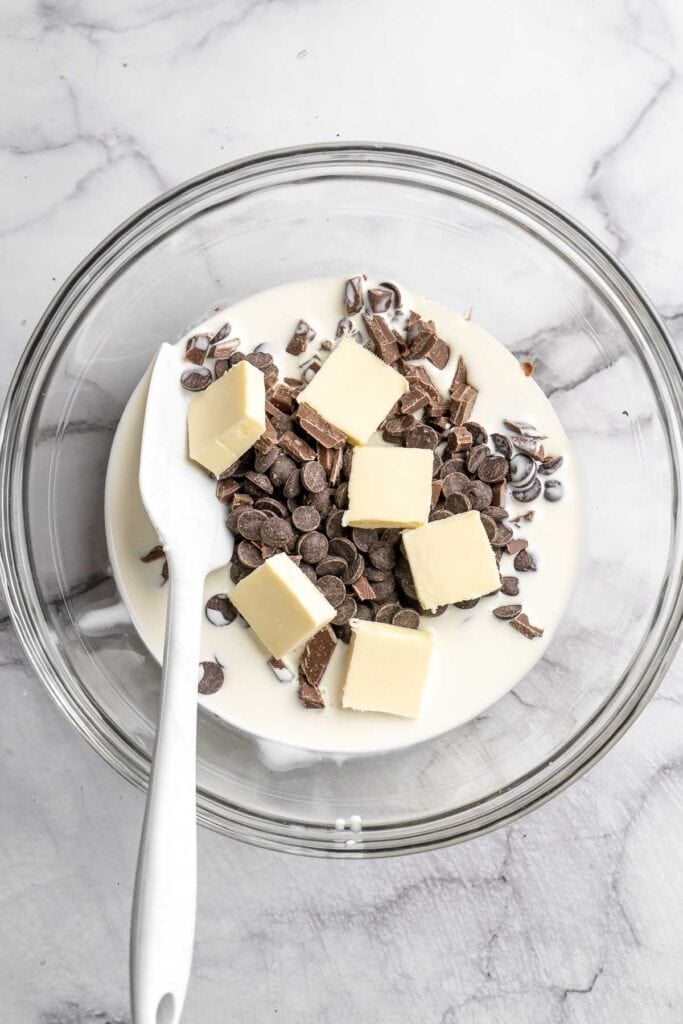 This Chocolate Tart is rich, decadent, and layered with the perfect balance of chocolate ganache and Oreo cookie crust. Way easier to make than you think! | aheadofthyme.com