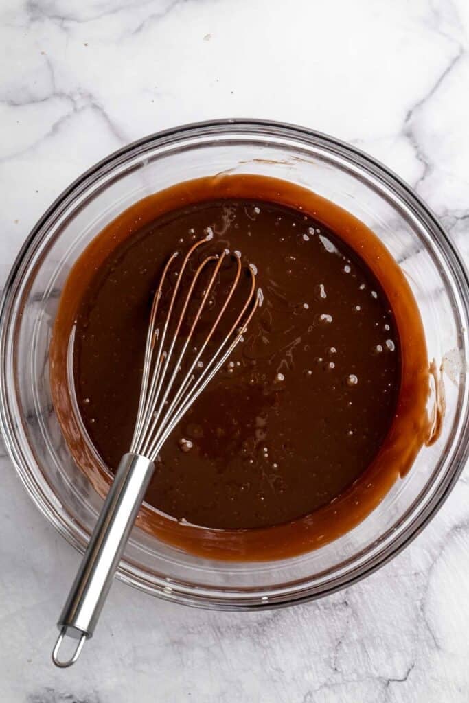 This Chocolate Tart is rich, decadent, and layered with the perfect balance of chocolate ganache and Oreo cookie crust. Way easier to make than you think! | aheadofthyme.com