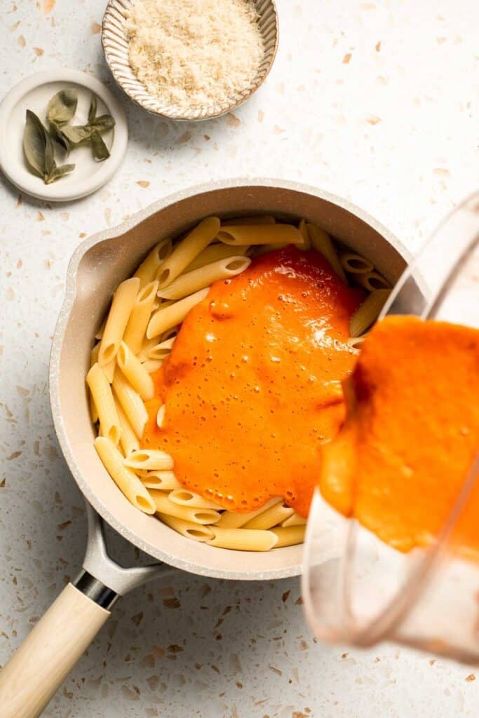 This Creamy Roasted Red Pepper Pasta is cozy, comforting, and packed with flavor. It comes together with simple ingredients in just 30 minutes. | aheadofthyme.com