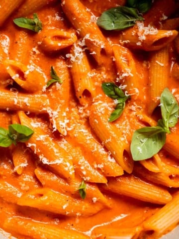 This Creamy Roasted Red Pepper Pasta is cozy, comforting, and packed with flavor. It comes together with simple ingredients in just 30 minutes. | aheadofthyme.com