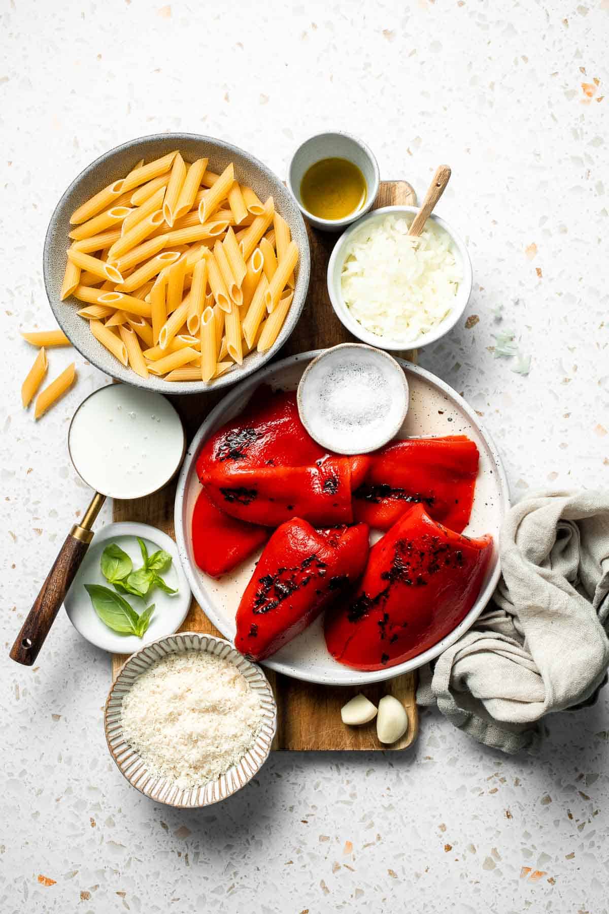 This Creamy Roasted Red Pepper Pasta is cozy, comforting, and packed with flavor. It comes together with simple ingredients in just 30 minutes. | aheadofthyme.com