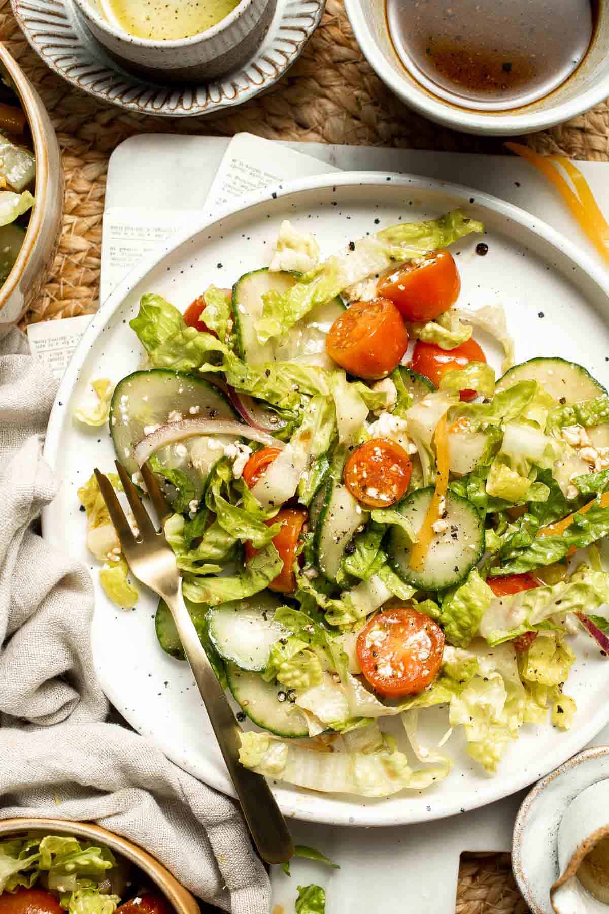 Easy Tossed Salad is crisp, colorful, and fresh, made with crunchy romaine lettuce, juicy tomatoes, crisp cucumber, and a simple balsamic vinaigrette. | aheadofthyme.com