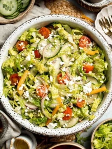 Easy Tossed Salad is crisp, colorful, and fresh, made with crunchy romaine lettuce, juicy tomatoes, crisp cucumber, and a simple balsamic vinaigrette. | aheadofthyme.com