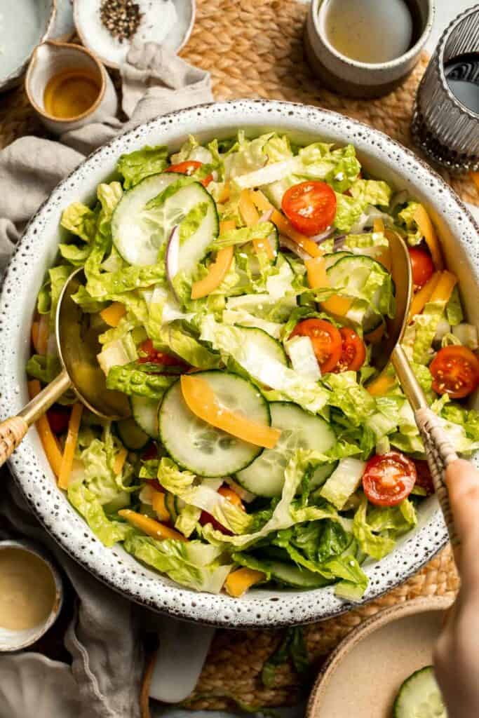 Easy Tossed Salad is crisp, colorful, and fresh, made with crunchy romaine lettuce, juicy tomatoes, crisp cucumber, and a simple balsamic vinaigrette. | aheadofthyme.com