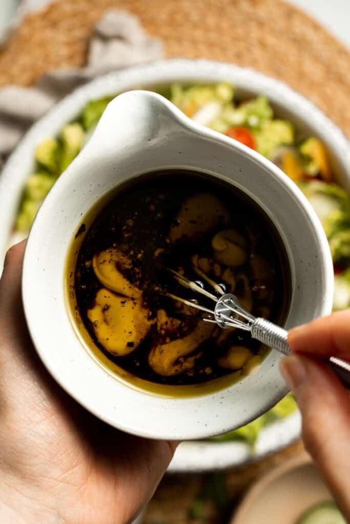 Easy Tossed Salad is crisp, colorful, and fresh, made with crunchy romaine lettuce, juicy tomatoes, crisp cucumber, and a simple balsamic vinaigrette. | aheadofthyme.com