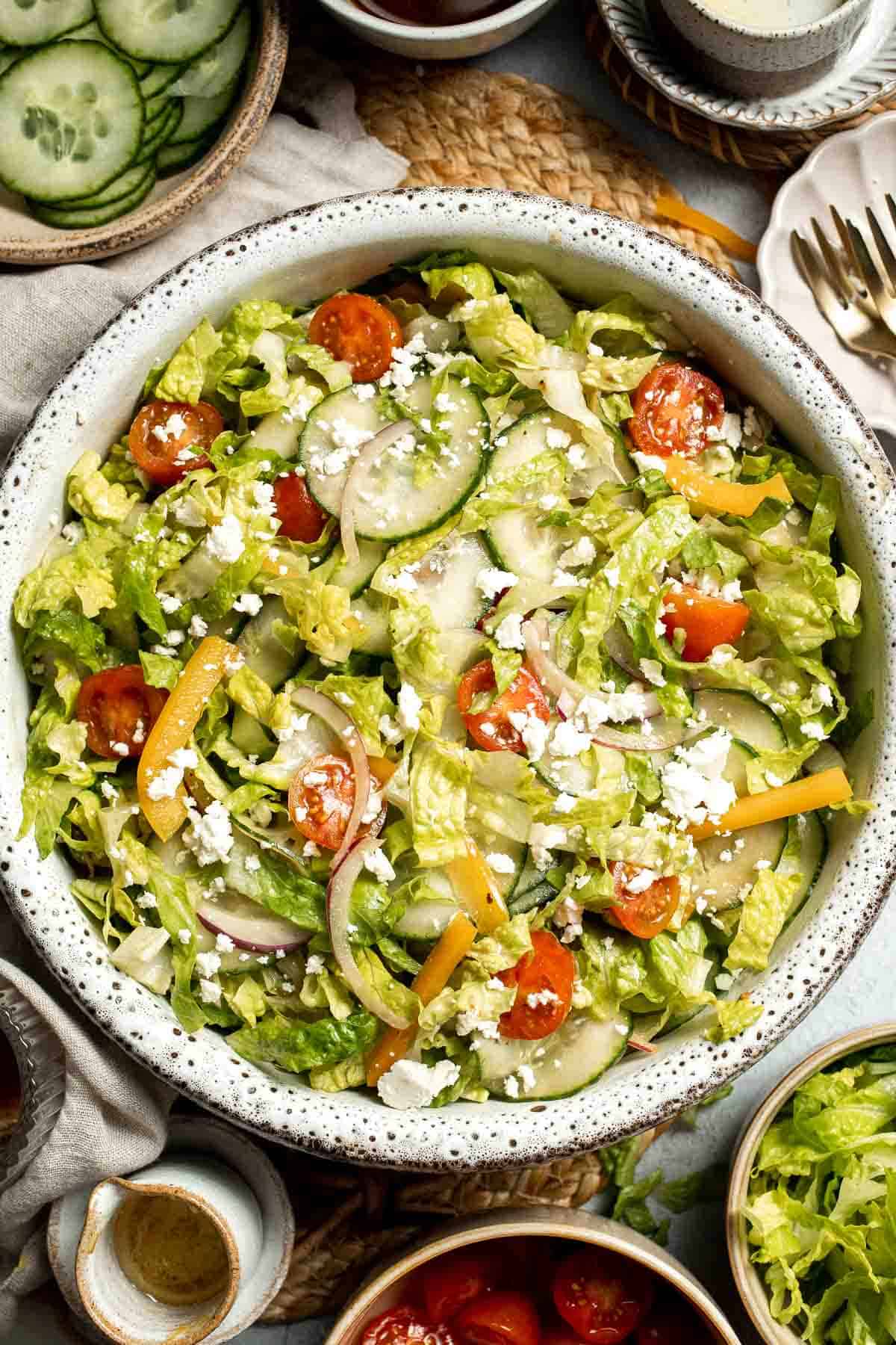 Easy Tossed Salad is crisp, colorful, and fresh, made with crunchy romaine lettuce, juicy tomatoes, crisp cucumber, and a simple balsamic vinaigrette. | aheadofthyme.com