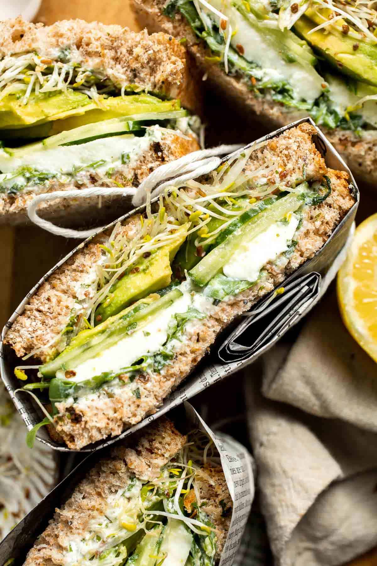 Green Goddess Sandwich is a fresh and vibrant twist on a classic veggie sandwich, packed with a creamy herb sauce, crisp veggies, avocado, and mozzarella. | aheadofthyme.com