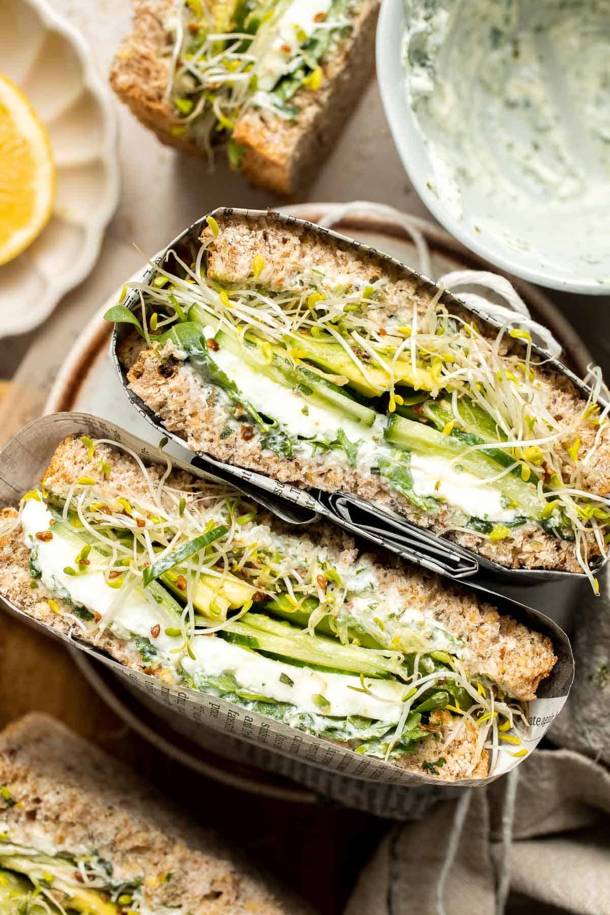 Green Goddess Sandwich is a fresh and vibrant twist on a classic veggie sandwich, packed with a creamy herb sauce, crisp veggies, avocado, and mozzarella. | aheadofthyme.com