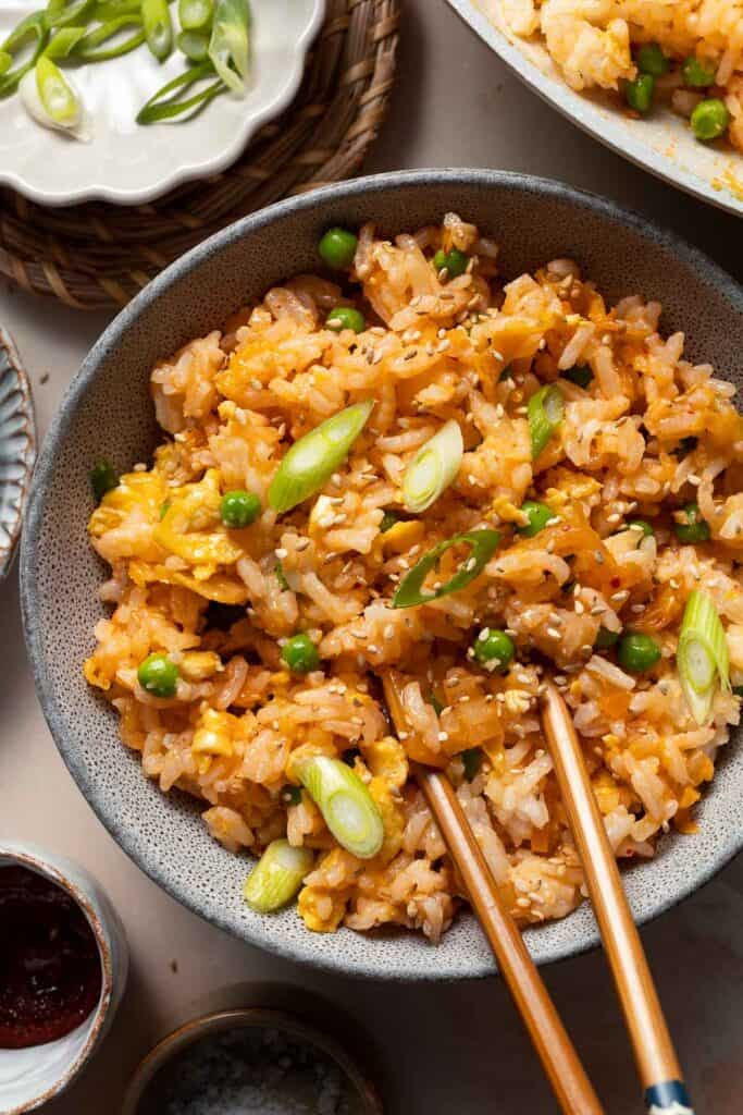 Kimchi Fried Rice is a bold, flavorful dish that takes just minutes to prepare using a few simple ingredients — and a great way to use up leftover rice! | aheadofthyme.com