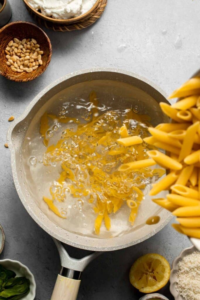 Lemon Ricotta Pasta is bright, creamy, and bursting with fresh flavor — comfort food with a zesty twist. Ready in under 20 minutes! | aheadofthyme.com