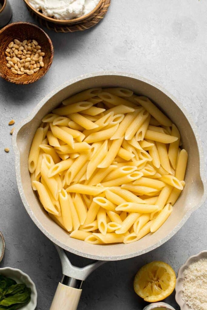 Lemon Ricotta Pasta is bright, creamy, and bursting with fresh flavor — comfort food with a zesty twist. Ready in under 20 minutes! | aheadofthyme.com