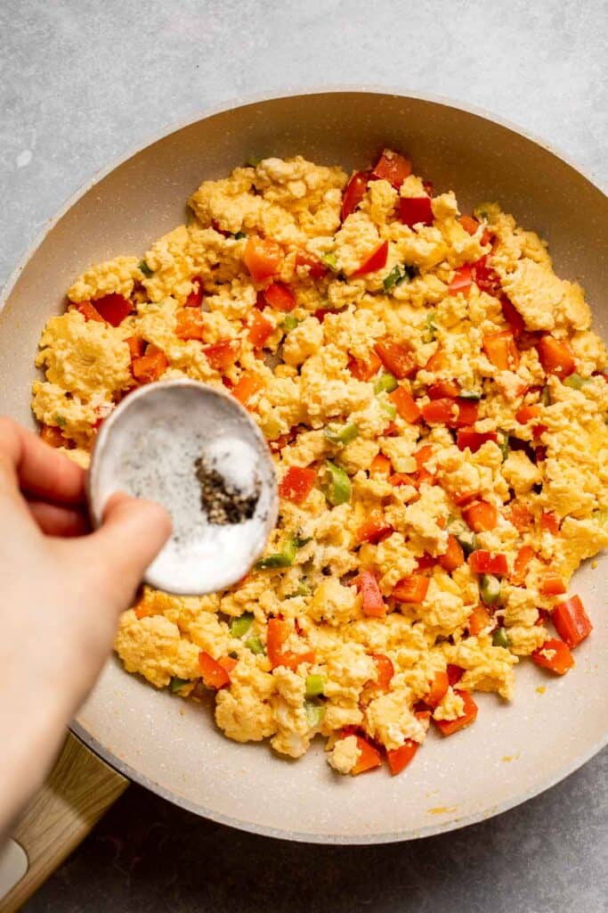Vegetarian Breakfast Burritos are packed with crispy potatoes, veggies, fluffy eggs, cheese, and avocado. A balanced breakfast that actually keeps you full! | aheadofthyme.com