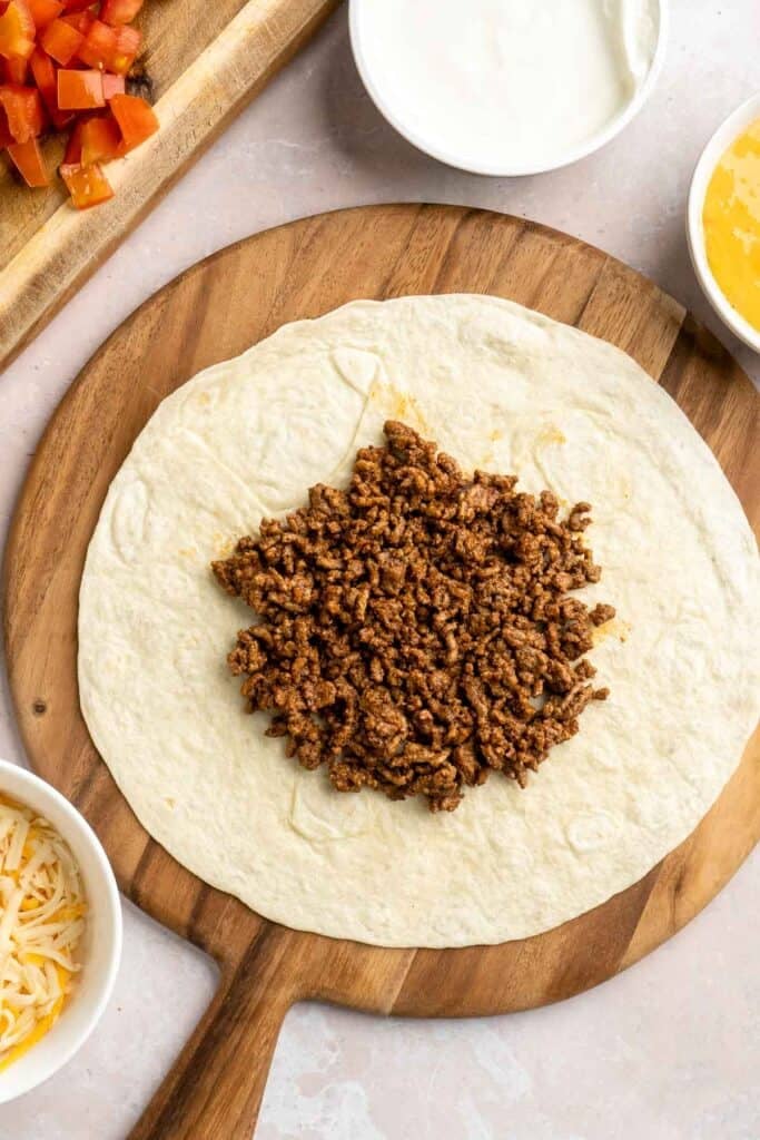 Homemade Crunchwrap is a crispy, cheesy, flavor-packed meal inspired by the fast-food favorite — only better! Easy to customize and freezer-friendly too. | aheadofthyme.com