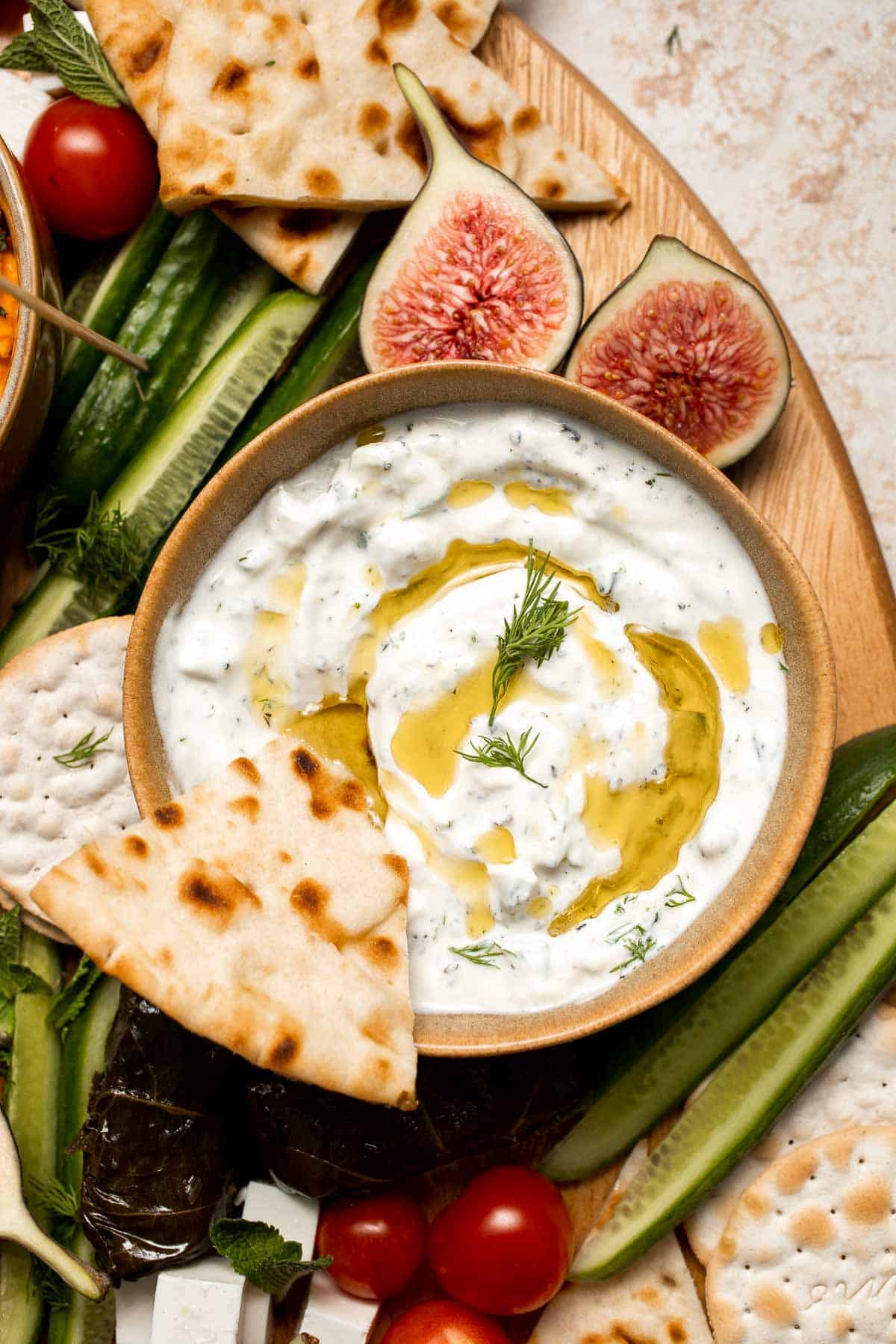 This easy Mezze Platter brings the best of Mediterranean snacking straight to your table with a colorful mix of dips, crisp vegetables, and briny bites. | aheadofthyme.com