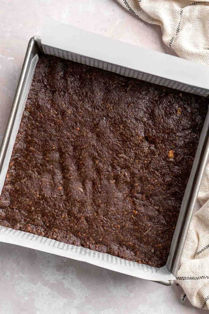 Classic Nanaimo Bars are a rich, no-bake Canadian dessert featuring three layers: chocolate-coconut graham base, custard center, and chocolate topping. | aheadofthyme.com