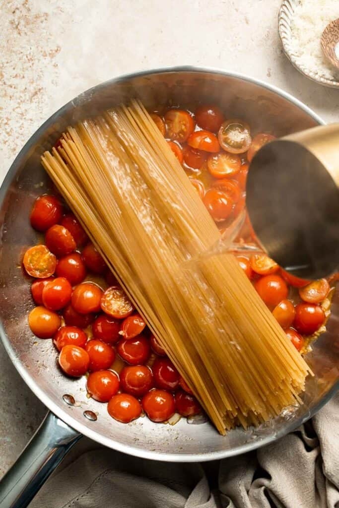 One Pot Pasta with Cherry Tomatoes (Meghan Markle Pasta) is a simple, creamy, and flavorful dish made in one pan for maximum flavor and minimal cleanup. | aheadofthyme.com