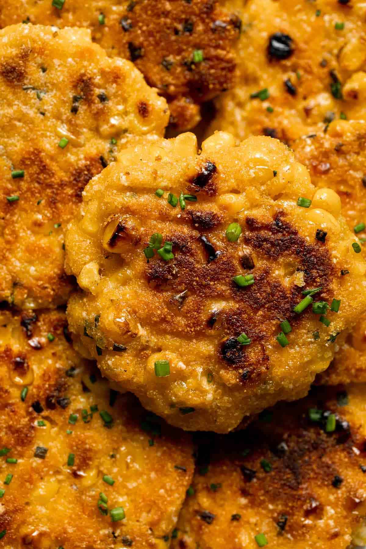 Crispy Corn Fritters are golden, savory, and quick to make. Perfect as a snack, appetizer, or side with your favorite summer meals! | aheadofthyme.com