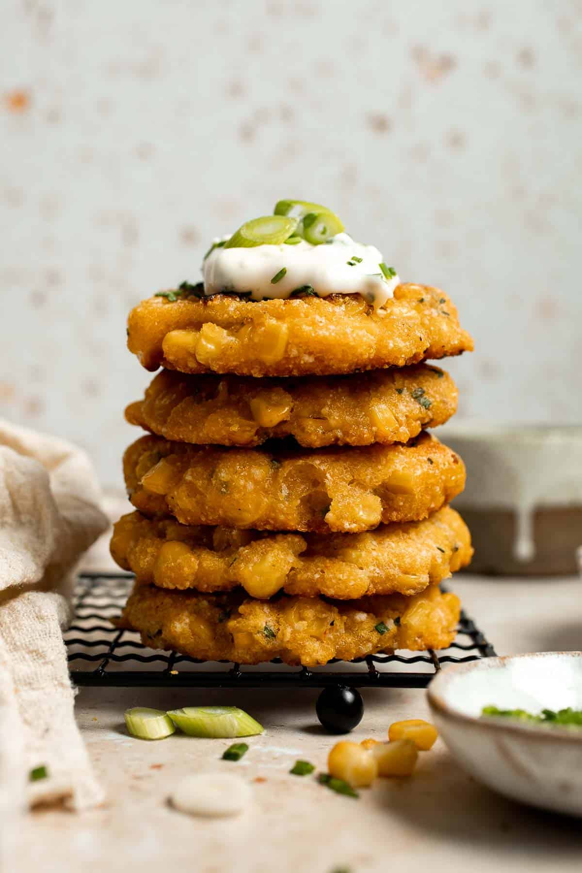 Crispy Corn Fritters are golden, savory, and quick to make. Perfect as a snack, appetizer, or side with your favorite summer meals! | aheadofthyme.com