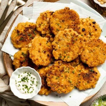 Crispy Corn Fritters are golden, savory, and quick to make. Perfect as a snack, appetizer, or side with your favorite summer meals! | aheadofthyme.com