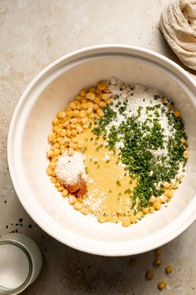 Crispy Corn Fritters are golden, savory, and quick to make. Perfect as a snack, appetizer, or side with your favorite summer meals! | aheadofthyme.com