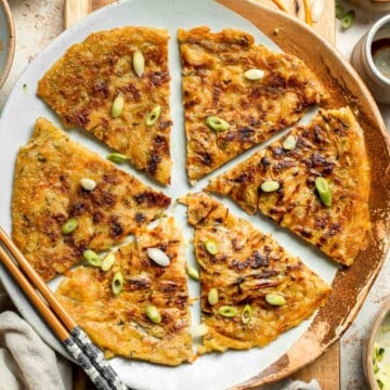 Crispy Korean Vegetable Pancakes (Yachaejeon) are quick, golden, and packed with colorful veggies. Serve with dipping sauce for a delicious snack or meal. | aheadofthyme.com