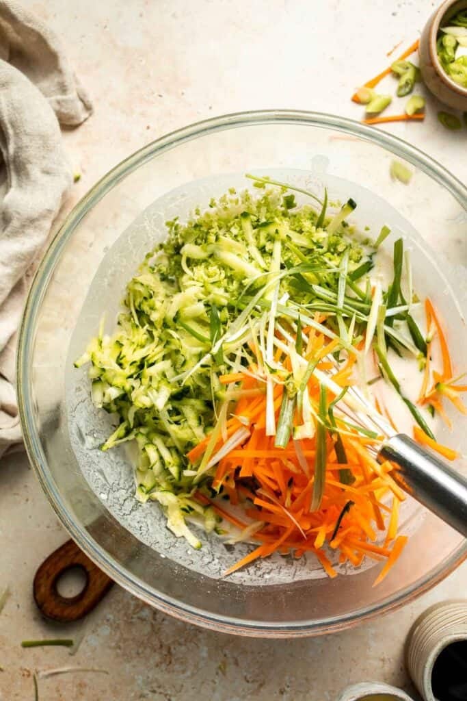 Crispy Korean Vegetable Pancakes (Yachaejeon) are quick, golden, and packed with colorful veggies. Serve with dipping sauce for a delicious snack or meal. | aheadofthyme.com