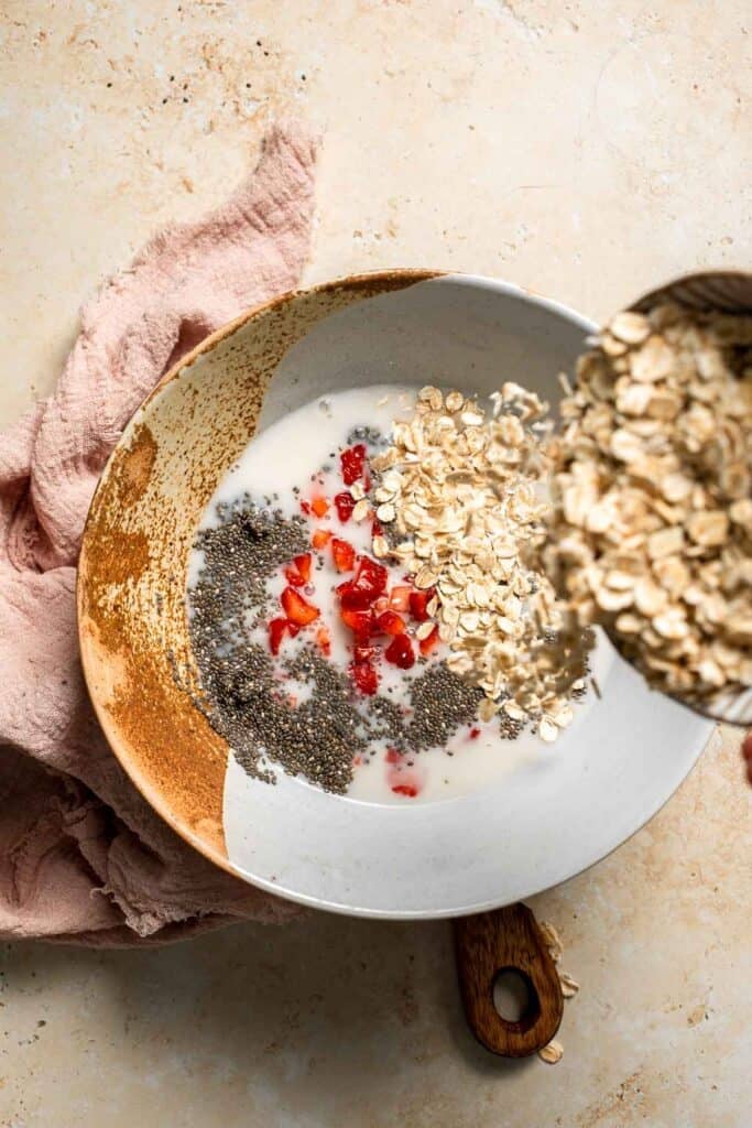Strawberry Overnight Oats are a healthy, make-ahead breakfast with rolled oats, Greek yogurt, and fresh strawberries. Perfect for busy mornings! | aheadofthyme.com