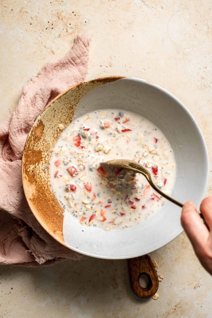 Strawberry Overnight Oats are a healthy, make-ahead breakfast with rolled oats, Greek yogurt, and fresh strawberries. Perfect for busy mornings! | aheadofthyme.com
