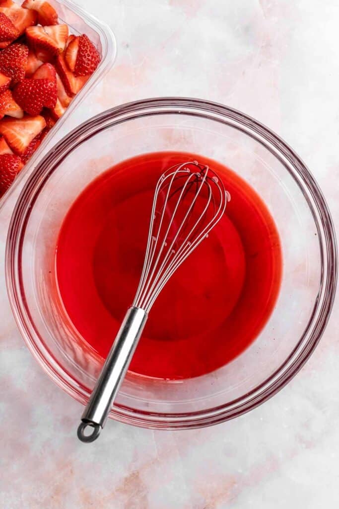 This Strawberry Pretzel Salad features a buttery pretzel crust, creamy filling, and fruity Jello topping — perfect for summer parties and potlucks! | aheadofthyme.com